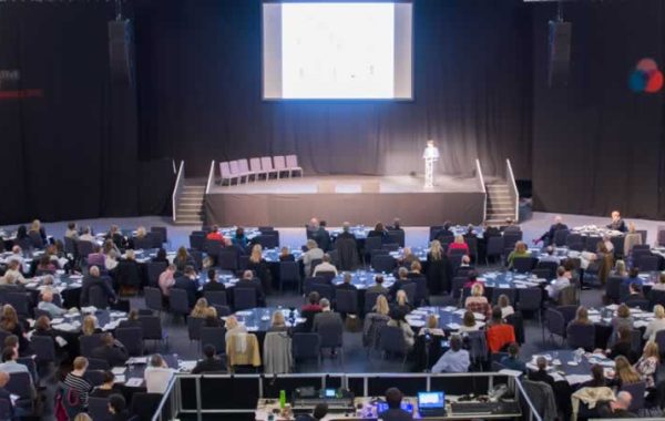 Tables at a large conference