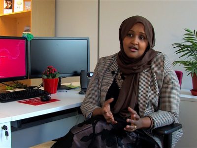 Nura Aabe being interviewed for the short film Overcoming Barriers