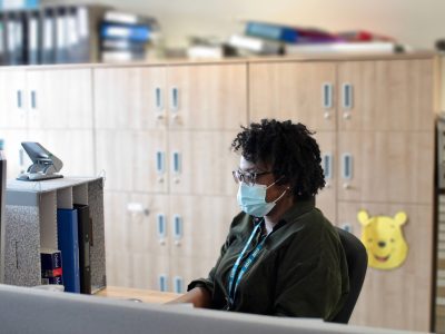 An NHS worker in a face mask