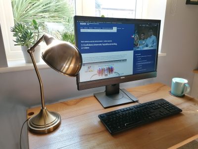 A computer monitor showing the ARC West online courses