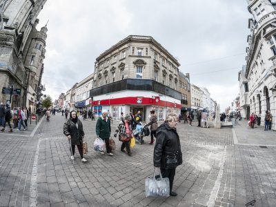 Shoppers in a pedestrianised street in Gloucester