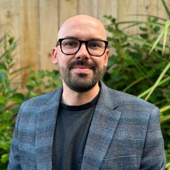 Dr Brendan Hallam